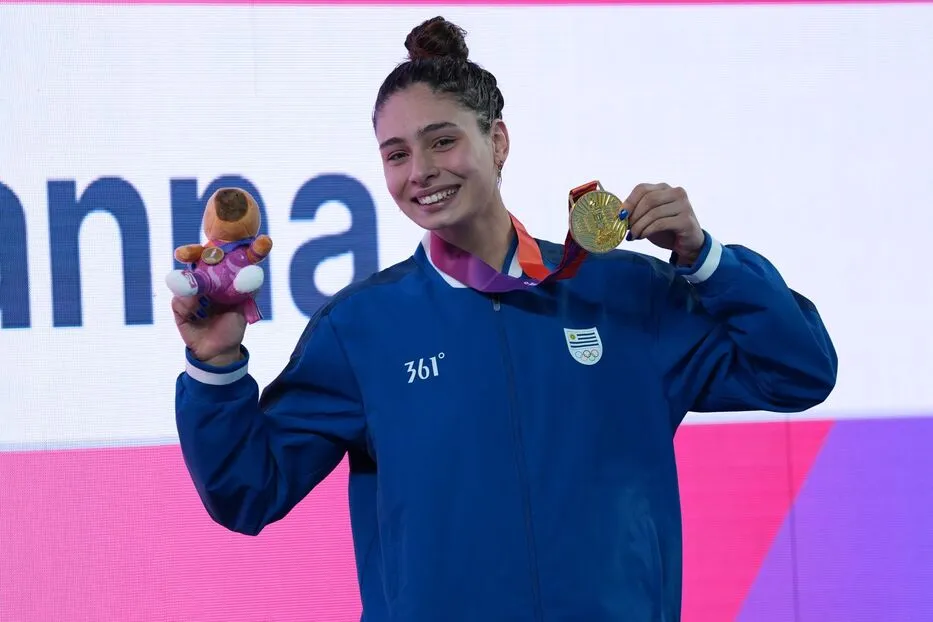 Foto sobre Angelina Solari hizo historia en los Odesur: oro para Uruguay y récord nacional en los 100 metros libres